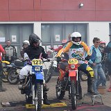 (77)